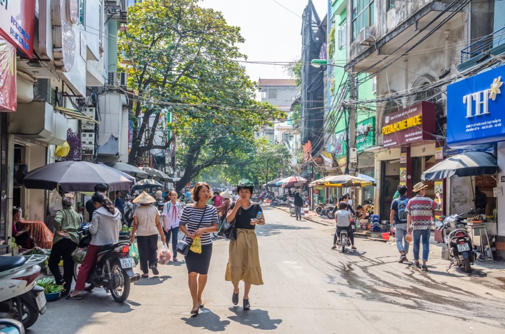 People walking in street in Vietnam